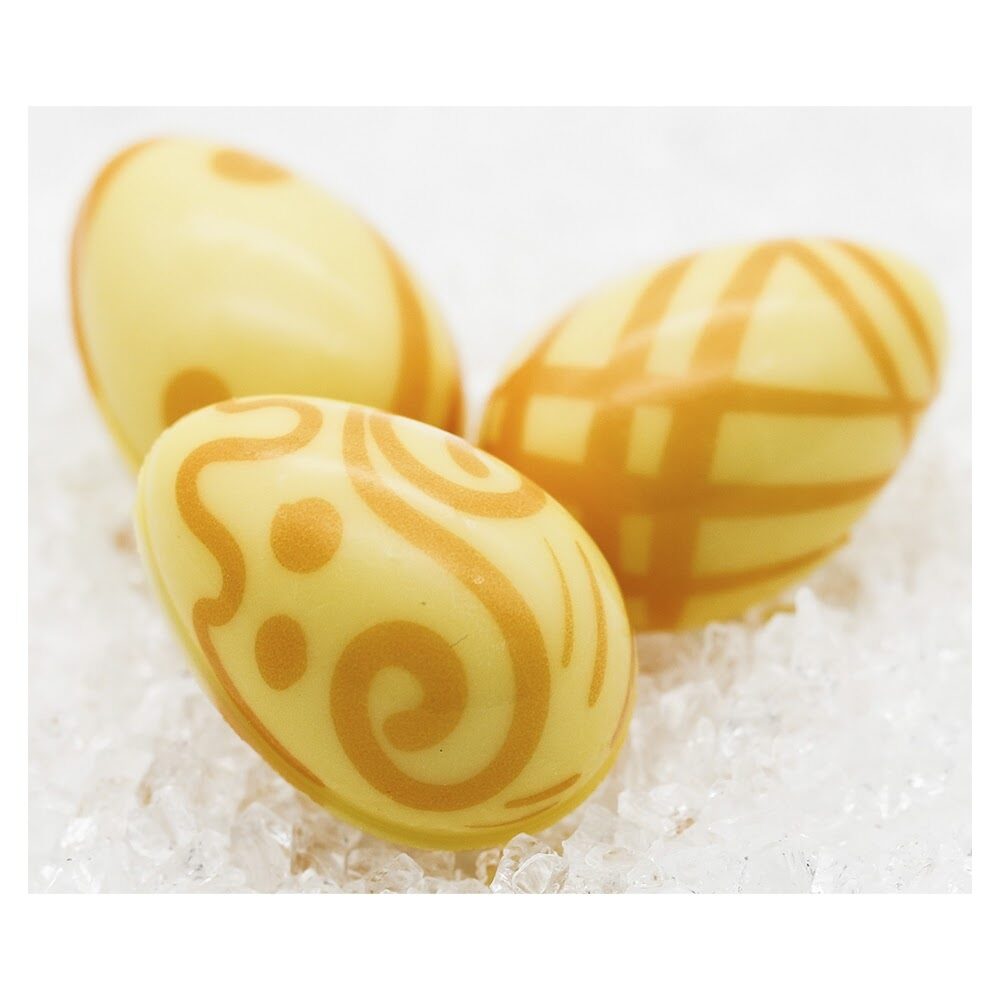 X96PCS DÉCORATIONS CHOCOLATÉES ŒUFS CHOC. BLANC ORANGE/JAUNE