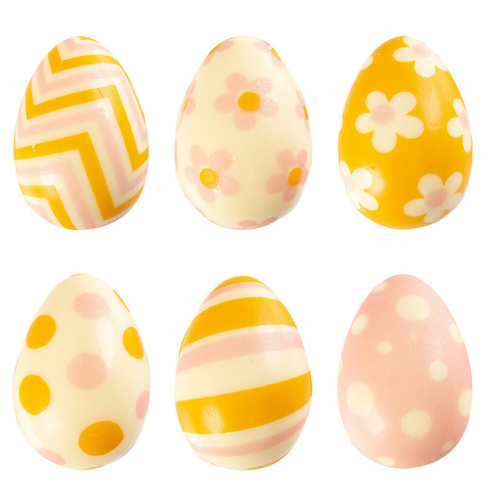 X96PC ASSORTMENT EGG 3D YELLOW/PINK L2,4 X 3,8CM CHOCOLATE